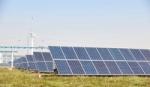 Solar panels and wind power, two key sources of green electricity used by Unilever