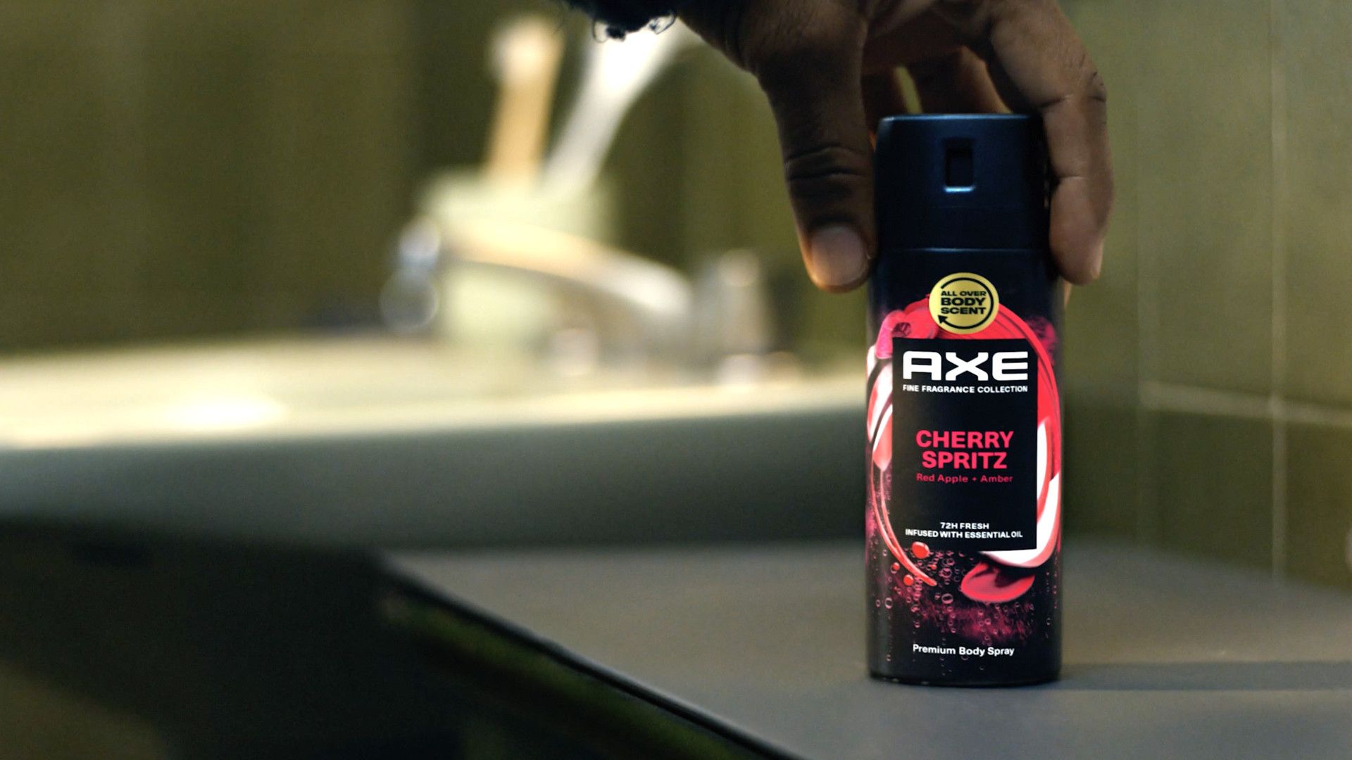 Axe Cherry Spritz body spray placed on a countertop.