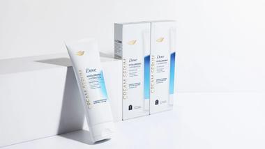 Dove Hyaluronic + Hydration Cream Serum, which contains pro-ceramides, niacinamide and collagen peptides. White, blue, gold packaging.