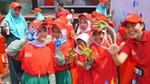 A group of children raise their hands whilst taking part of Lifebuoy’s handwashing programme
