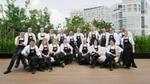 Group shot of Unilever Food Solutions chefs in white uniforms.