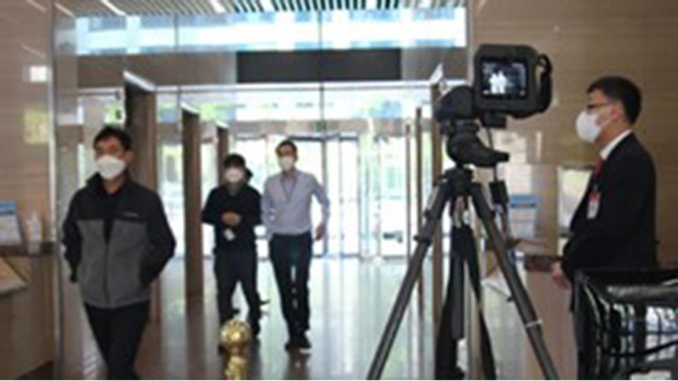 Unilever employees observing safety protocols and wearing masks