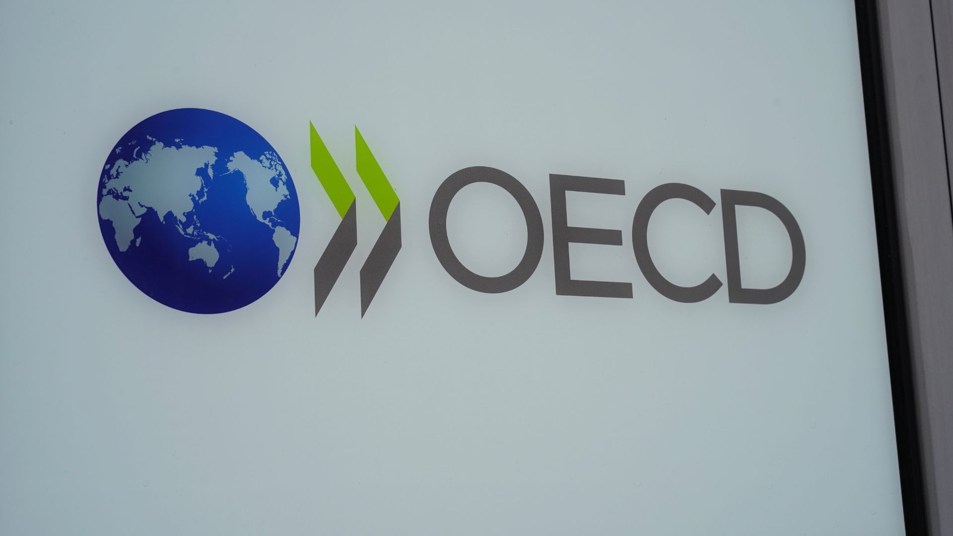 OECD logo on a sign