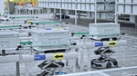A production line in one of Unilever’s WEF Global Lighthouse Network factories, where robots help move goods efficiently.