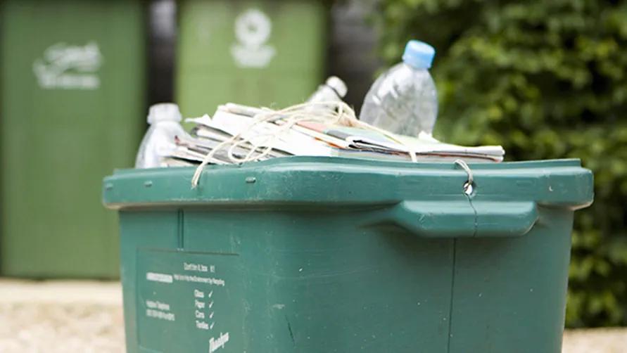 A full recycling bin