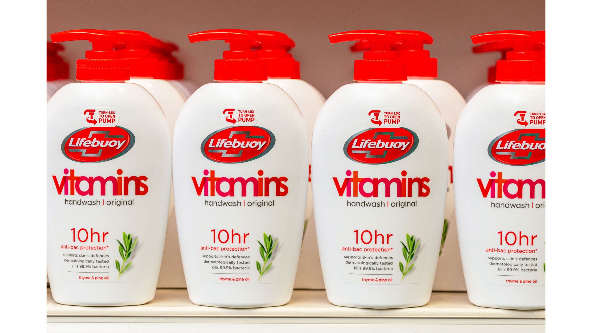 Bottles of Lifebuoy handwash on a supermarket shelf.