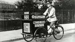A Walls ice cream seller riding a bicycle