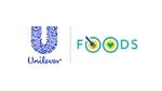 The image shows the Unilever logo on the left, which is a blue 'U' filled with various icons representing the company and its brands. Next to it, there is the word 'FOODS' written in green letters. The letter 'O' in 'FOODS' is stylised - the first as a plate with a fork inside it, and the second 'O' has a heart shape inside.