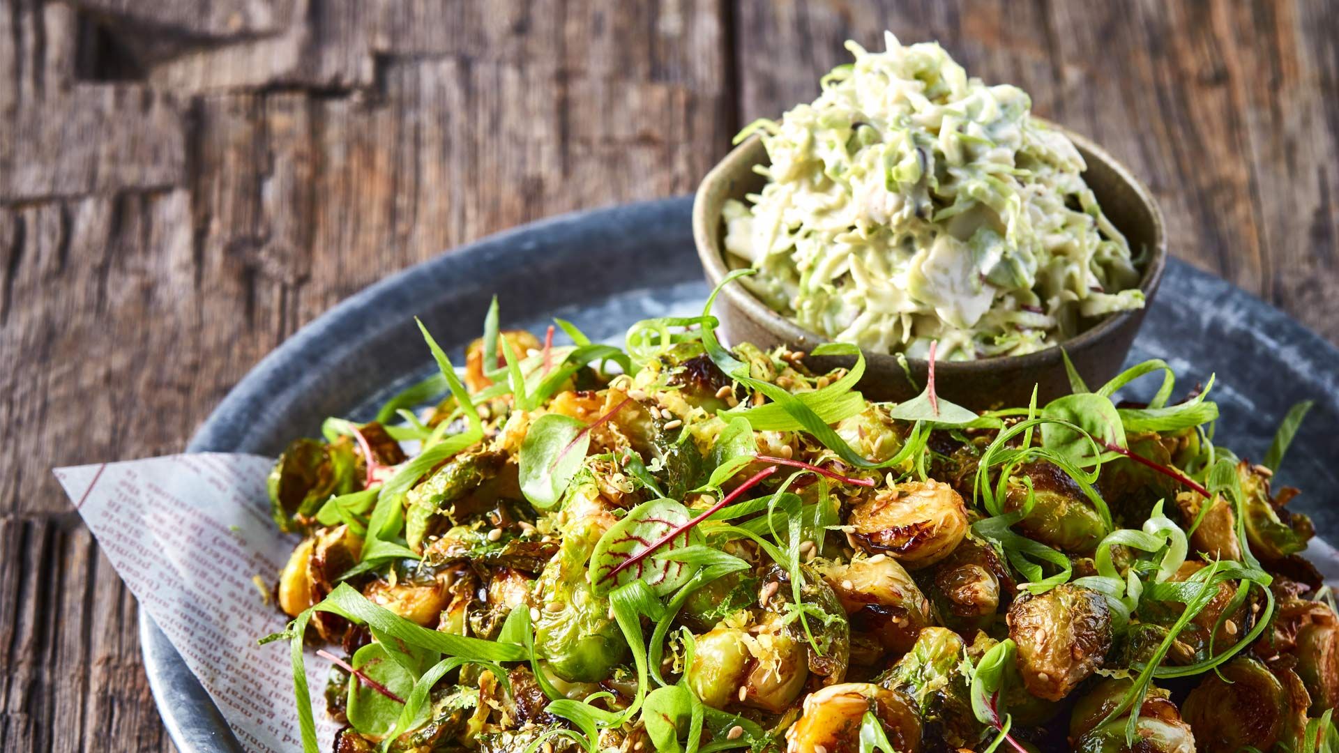 A plate of vegetables - charred Brussels sprouts with smoky gochujang glaze