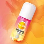 Sunsilk’s new Wonder Mist hair mist in Golden Glaze. A small pink and orange spray bottle on a pink and orange background.