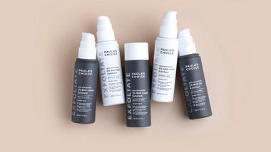 A photo of products from the Paula’s Choice AHA Exfoliant and BHA Exfoliant range. Packaging is white and dark grey.