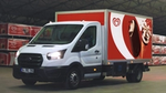 A Wall’s branded truck restocking products inside a warehouse.