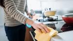 A person cleaning their kitchen