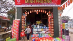 a market selling Unilever products in Vietnam. Products from OMO and many other brands are on display.
