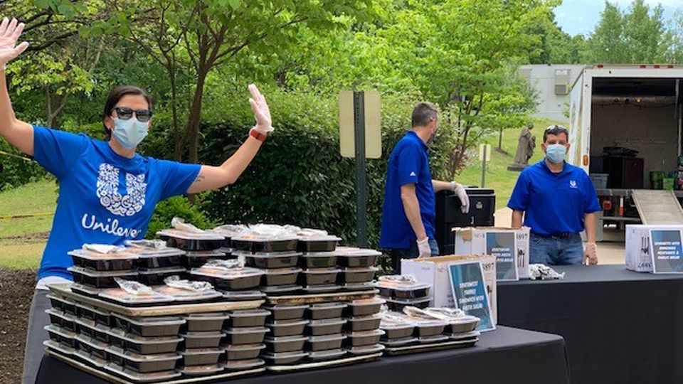 Prepacked meals on tables at Mercy Hospital, for Unilever’s meal donation event