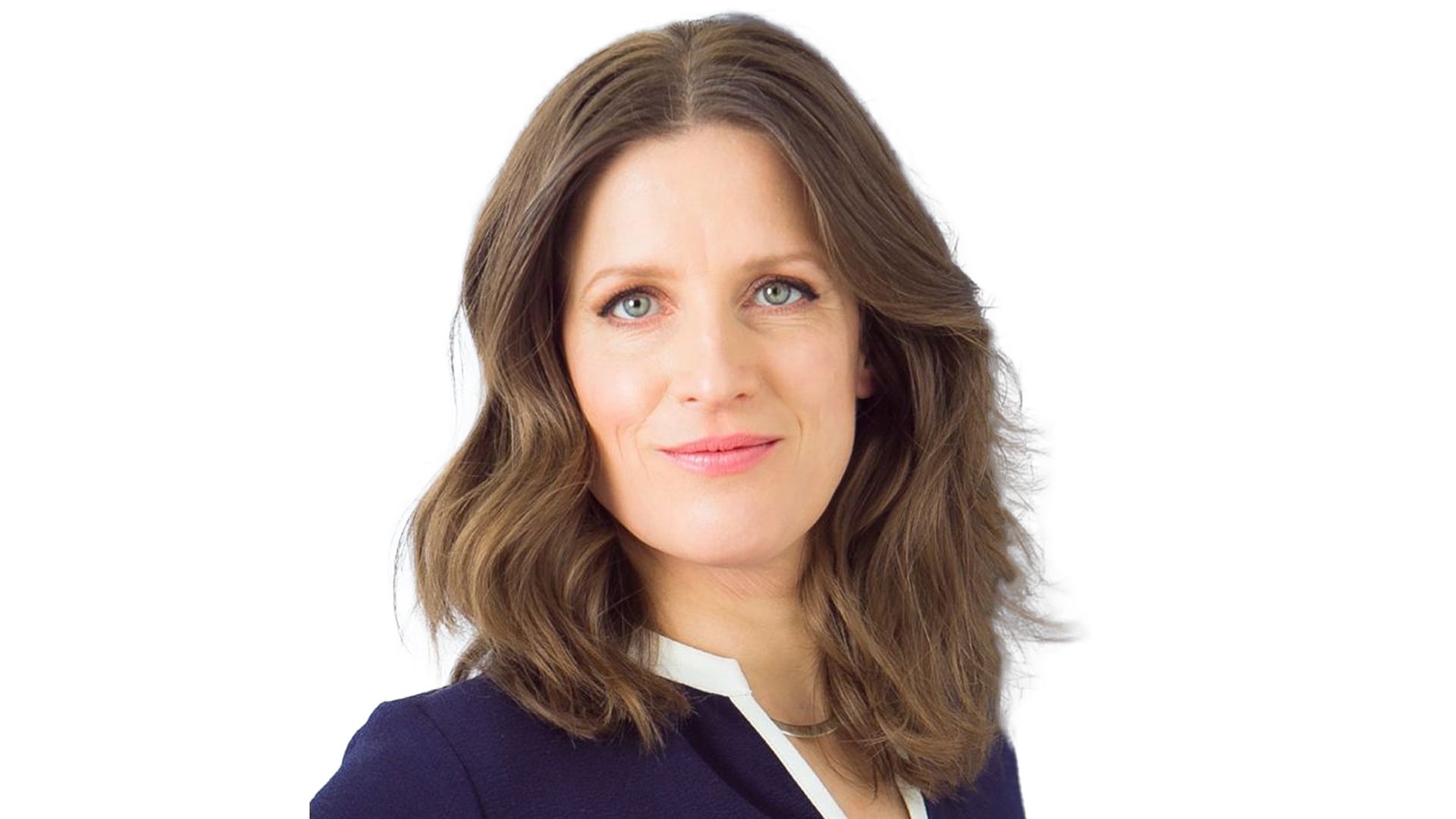 A photo of Dr Victoria Fraser, R&D Director for Dove. She is a white woman with brown hair and blue eyes, smiling at the camera.