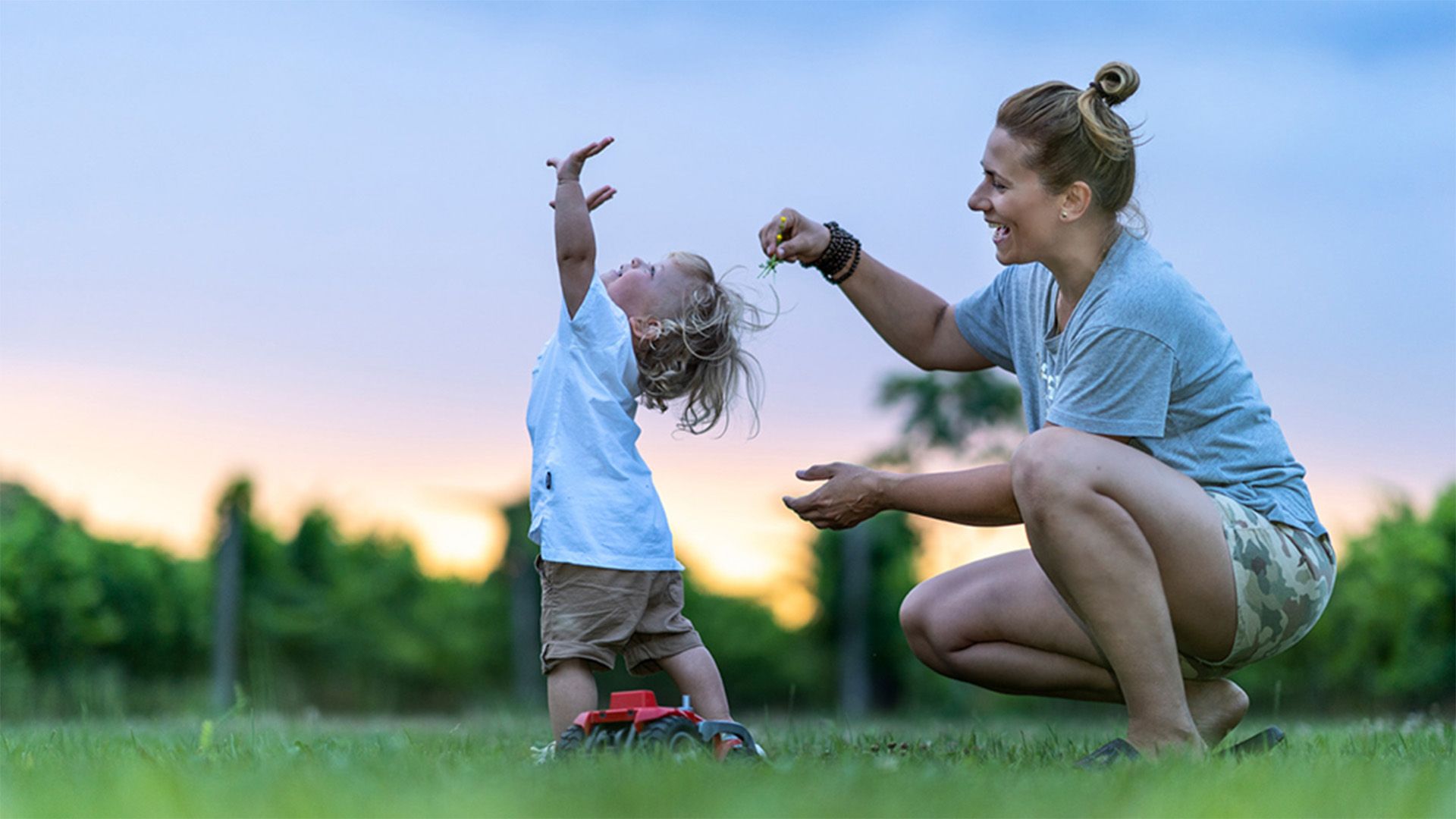 Photo of woman and child outside
