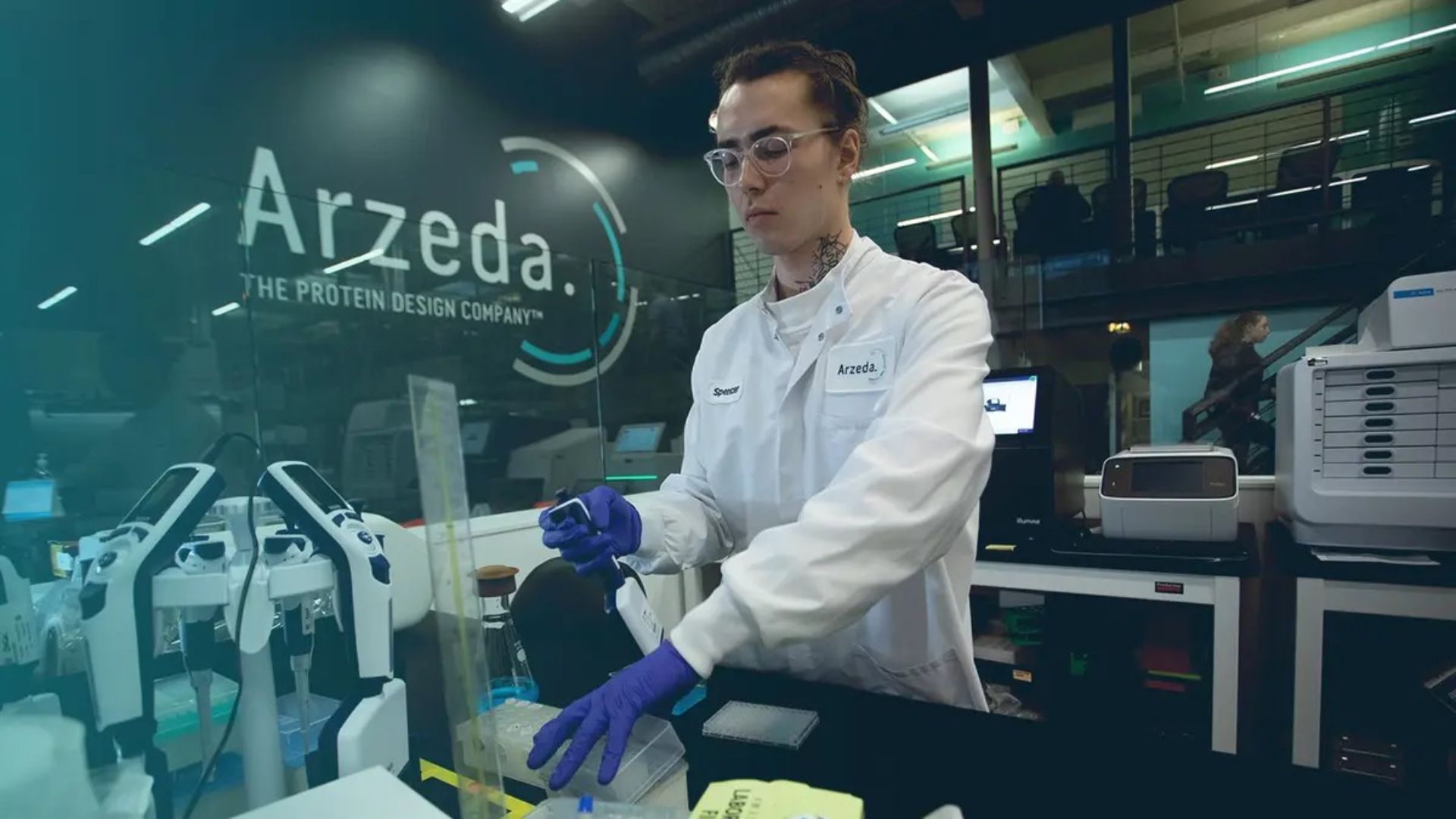 An image of a man working in a laboratory at Arzeda
